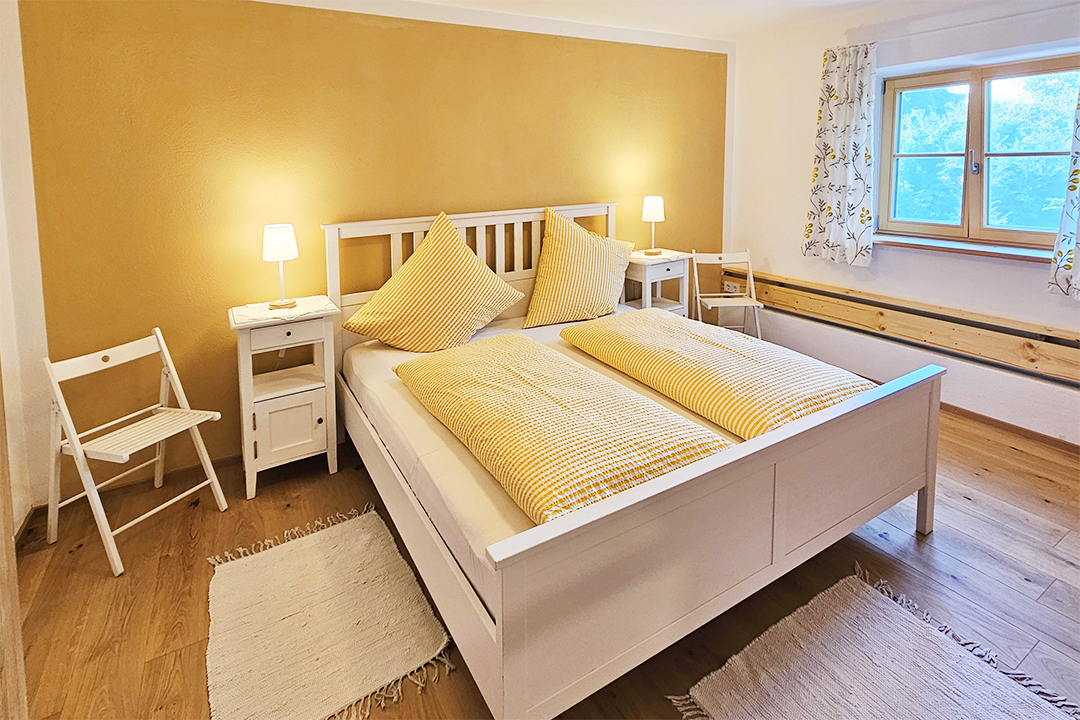Ferienwohnung Gärtnergassl am Chiemsee Schlafzimmer